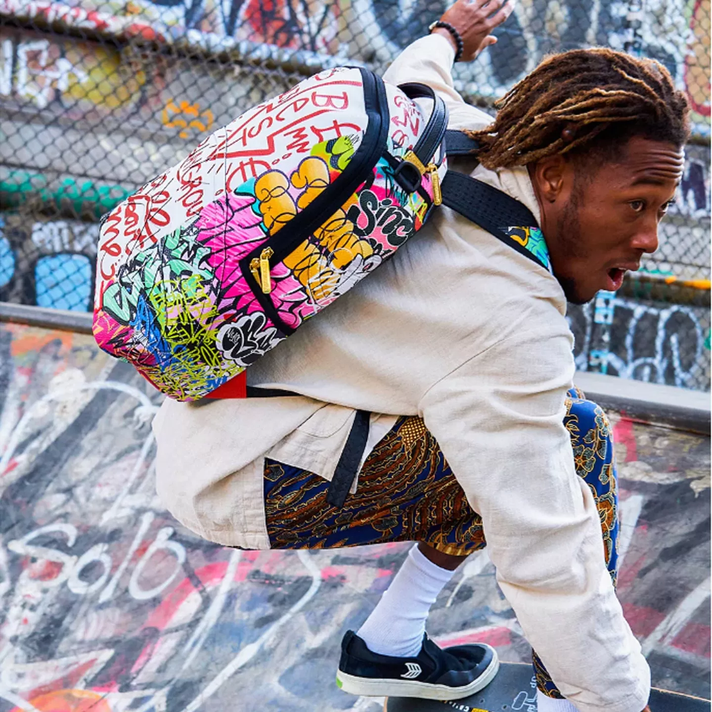 Sprayground Tri-Split Graffiti Backpack (DLXV)